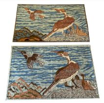 WALL HANGINGS, a pair, mid 20th century French, depicting a cormorant and another bird in flight,