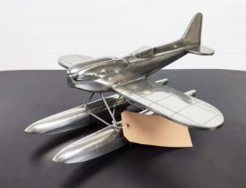 MODEL SEAPLANE, polished metal, 36cm x 46cm x 21cm.