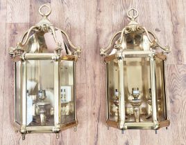 WALL LANTERNS, a pair, Victorian style, solid brass, one missing piece of glass. 52cm high, 25cm