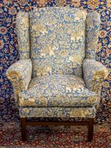 WING ARMCHAIR, 103cm H x 84cm W, Georgian style in blue elephant patterned fabric.