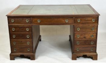 PARTNERS DESK, Victorian mahogany, tooled leather top, with eleven drawers to each side, raised on