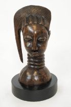 YORUBA (Nigerian, circa 1900), 42cm H, a carved crest head representing the God of the Ancestors '