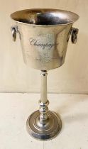 CHAMPAGNE COOLER ON STAND, polished metal, 78cm high, 33cm diameter