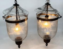 BELL JAR HALL LANTERNS, a pair, glass reeded tapering and bronze style mounted, 58cm H x 34cm. (2)