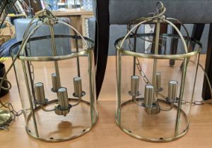 HALL LANTERNS, a pair, gilt metal and glazed, each with four branch light, 200cm drop each. (2)