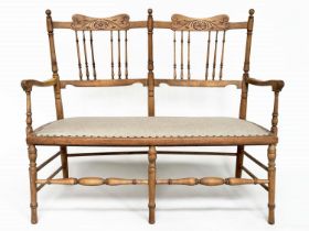 HALL SEAT, early 20th century Edwardian fruitwood with turned and pierced spindle back and studded