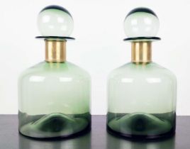 DECANTERS, a pair, Murano style, green glass, gilt metal collars, 37cm high. (2)