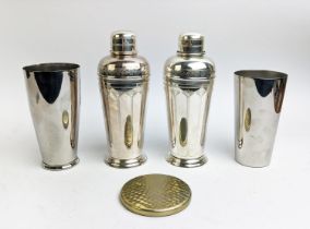 COCKTAIL SHAKERS, a pair, Art Deco style, silver plated, engraved decoration, with extra coaster. (