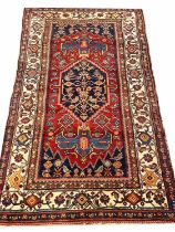 ANTIQUE NORTHWEST PERSIAN RUG, 215cm x 128cm.