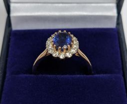 AN 18CT GOLD KYANITE AND DIAMOND DRESS RING, the central kyanite stone of approximately 1.42 carats,