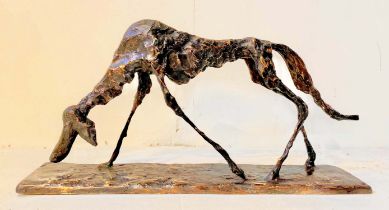 FIGURE OF A DOG, BRONZE, abstract form, in standing position, 30cm high, 60cm wide, 12cm deep