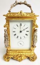 A FRENCH LATE 19TH CENTURY CARRIAGE CLOCK, Rococo revival style, gilt metal case with silvered