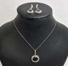 AN 18CT WHITE GOLD SAPPHIRE AND DIAMOND NECKLACE AND EARRING SET, the necklace with a single faceted