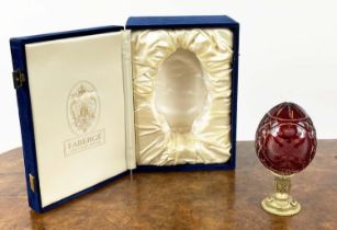 FABERGE EGG, Bohemian cut glass with eagle armorial heraldry on stem in original blue box, 18cm H.