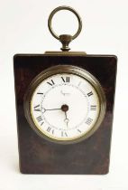 AN ASPREY TORTOISESHELL TRAVELLING MANTEL CLOCK, early 20th Century, white enamelled dial, Roman