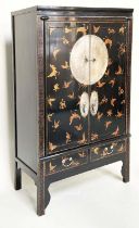MARRIAGE CABINET, early 20th century Chinese black lacquered and gilt Chinoiserie decorated with two