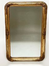 WALL MIRROR, mid 19th century French giltwood and gesso moulded with bevelled mirror plate and