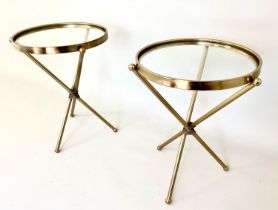 SIDE TABLES, a pair, 55cm high, 42cm diameter, glass inset tops, gilt metal triform supports. (2)