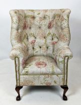 WING ARMCHAIR, 114cm H x 78cm W, Georgian style with barrel back in foliate upholstery.