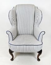 WING ARMCHAIR, 124cm H x 86cm W, late 19th/early 20th century walnut in new ticking with blue velvet