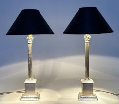 COLUMN TABLE LAMPS, a pair, silvered metal each with reeded columns and plinth bases, 56cm H. (2)