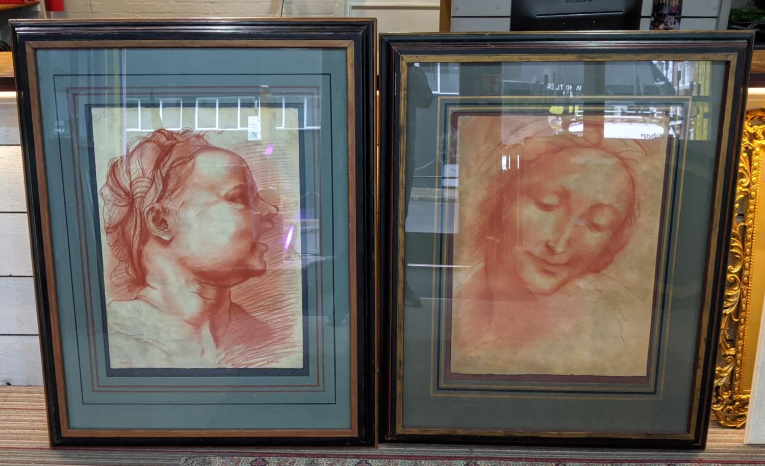 SANGUINE PORTRAITS, a pair, in the old master style, pastel on paper, signed S. Dooley, 123cm x