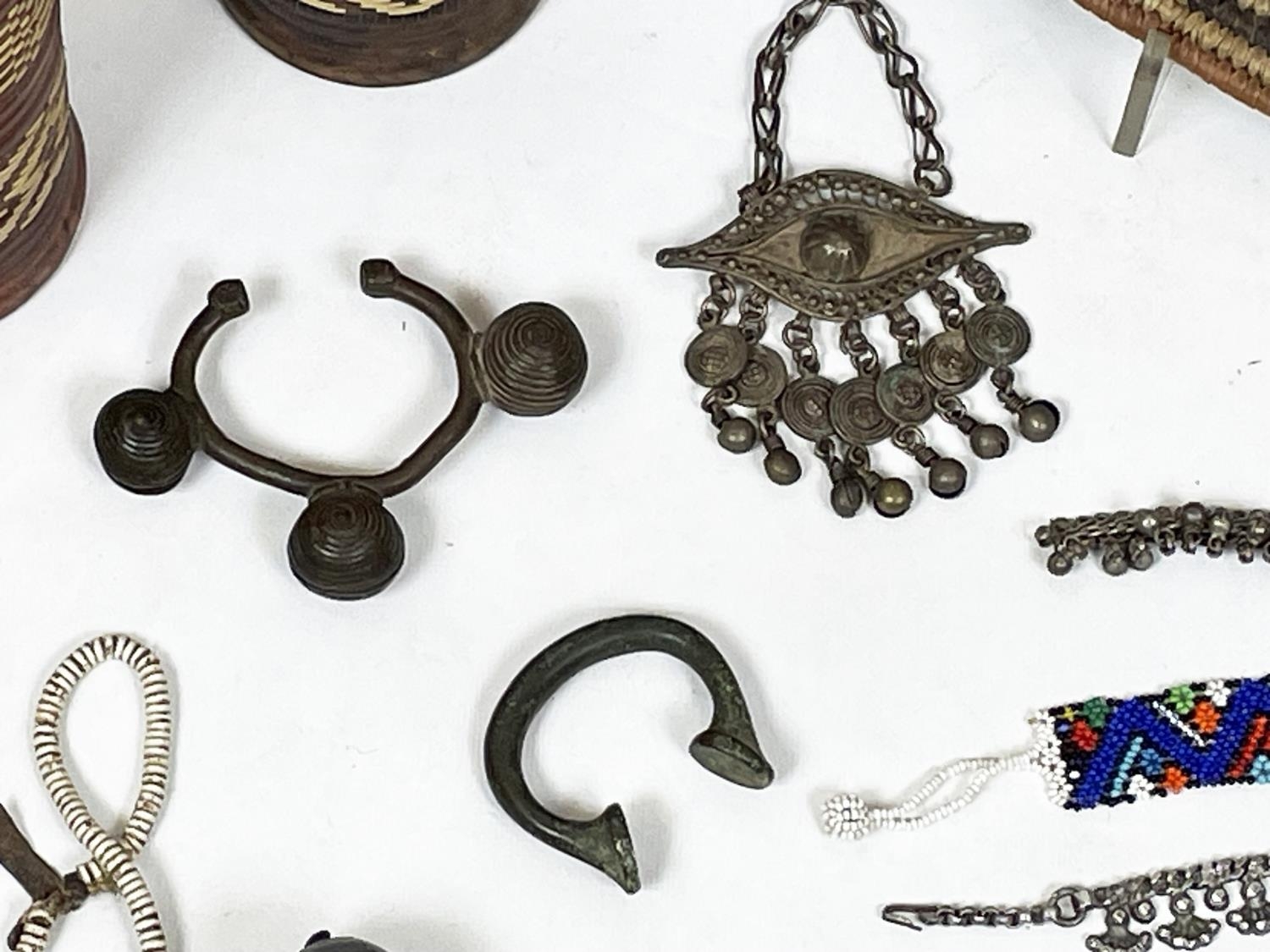 AFRICAN TRIBAL ITEMS, various including a West African bronze Manilla (money) and ankle bracelet two - Image 10 of 10