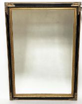 WALL MIRROR, Italian style rectangular bevelled mirror with moulded black frame and gilt moulded