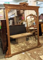 OVERMANTEL MIRROR, approx 165cm W x 178cm H, late Victorian in a gilt painted finish decorative