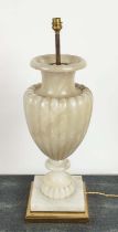 SIDE LAMP, in the form of an alabaster urn on a brass base, 67cm tall including stem, no shade.