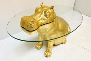 HIPPOPOTAMUS LOW TABLE, gilt resin, glass top, 60cm x 45cm x 50cm.