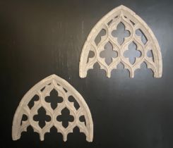 ARCHITECTURAL WALL MOUNTS, a pair, Gothic style, resin in faux stone finish, 80cm x 68cm approx. (2)