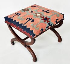 HEARTH STOOL, Regency rosewood with tribal Kelim upholstery and carved 'x' frame support, 52cm x