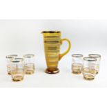 A MID 20TH CENTURY ITALIAN AMBER COLOURED WINE JUG, circa 1960, with six beakers, the beakers with