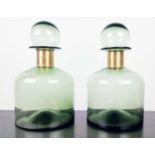 DECANTERS, a pair, Murano style, green glass, gilt metal collars, 37cm high. (2)