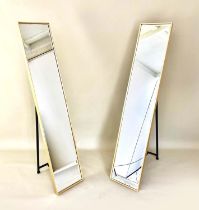 DRESSING MIRRORS, a pair, 1960's French style, free standing, gilt frames, 152cm high, 30cm wide. (