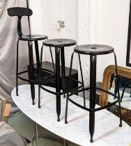 BAR STOOLS, a collection of three, black painted metal, 107cm H at tallest. (3)