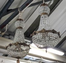 BAG CHANDELIERS, a pair, French Empire style, with gilt metal mounts, 74cm drop. (2)