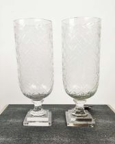 HURRICANE LANTERNS, a pair, cut glass on stepped bases, 41cm H. (2)