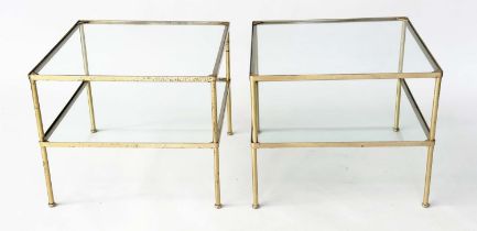 LAMP TABLES, a pair, 1970s, gilt metal, square with two glazed tiers and capped tubular supports,