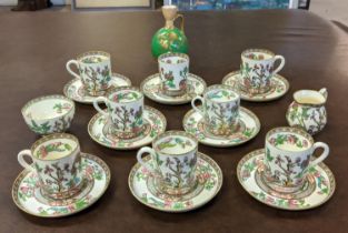 A COALPORT 'INDIAN TREE' PATTERN COFFEE SET, late Victorian, circa 1880, including eight can and