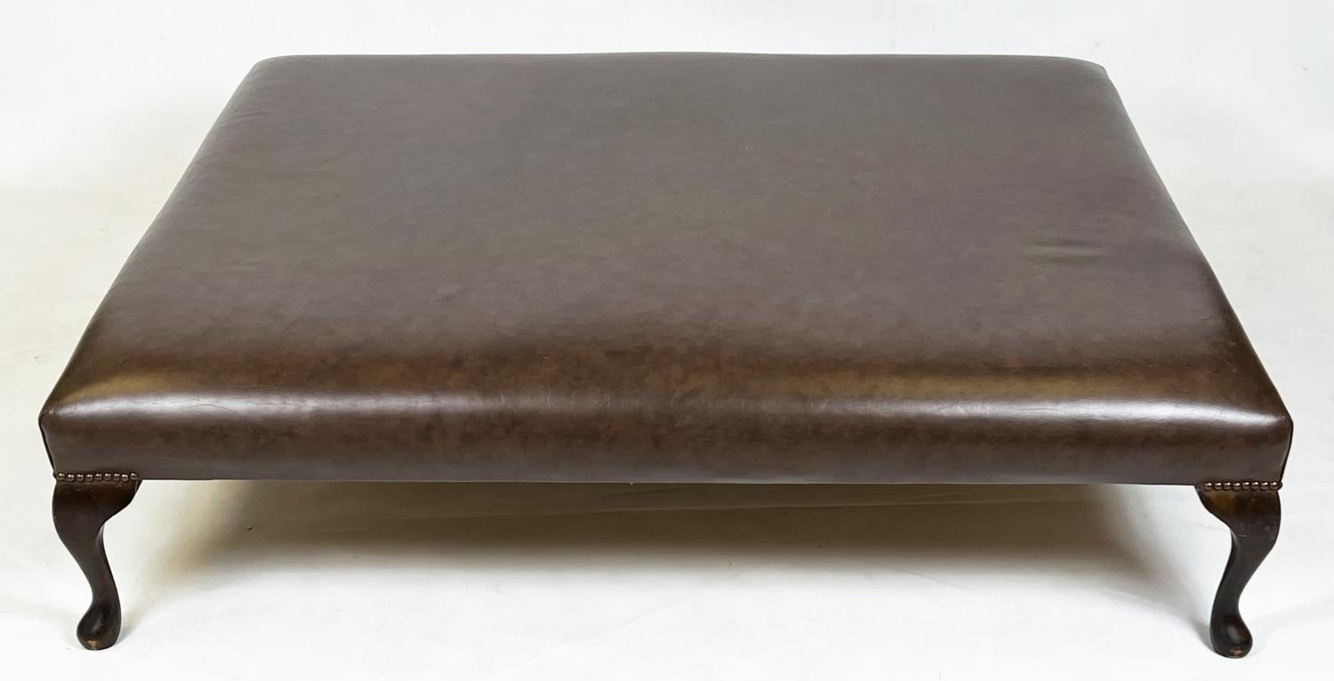 HEARTH STOOL, Georgian style rectangular tan leather raised on mahogany cabriole supports, 140cm x
