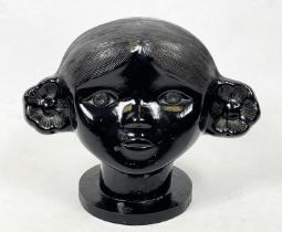 USSR BUST OF A GIRL, circa 1960s, black painted ceramic on a wooden plinth base, 24cm W x 20cm H.