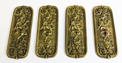 SET OF FOUR BRASS DOOR FINGER PLATES, Art Nouveau style, cast, each depicting a cherub amongst