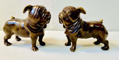 BRONZE BULL DOGS, a pair, 23cm x 31cm x 11cm. (2)