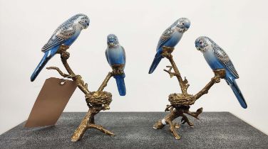 CANDLESTICKS, a pair, with blue parrots in ceramic and gilt metal, 26cm H. (2)