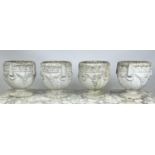 JARDINIERES, a set of four, Neo Classical design composite stone with Greek key, grape vine and ring