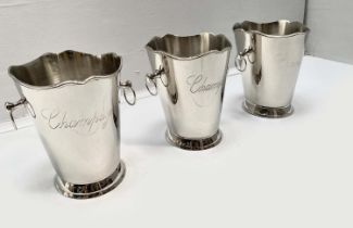 CHAMPAGNE BUCKETS, a set of three, polished metal, each twin handled, 23cm high, 22cm wide, 19cm