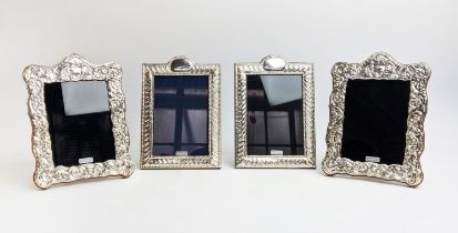 PHOTO FRAMES, two pairs, each bearing "hallmarked silver made in England" stickers, 20cm H x 14cm W.