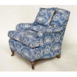 PIERRE FREY ARMCHAIR, Howard style, rounded arms, feather cushion and turned front supports, with